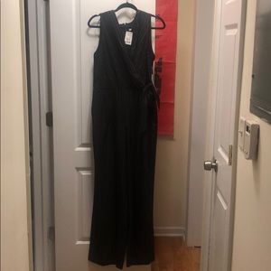 Wide leg black jumpsuit with silver detail